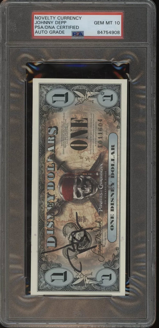 Johnny Depp / Jack Sparrow Signed Disney Dollar Pirates of the Carribbean PSA/DNA 10